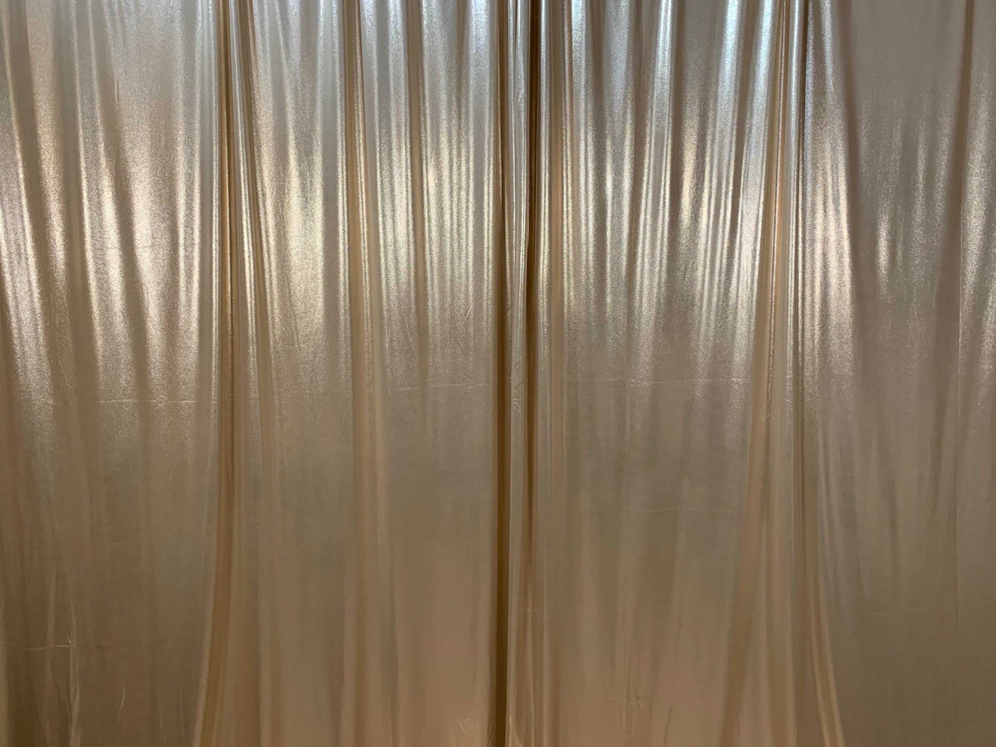 Shimmer gold backdrop with light filtering through